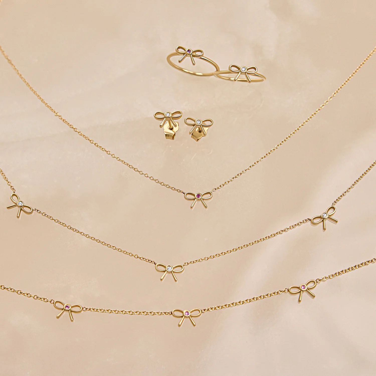Dainty Pink Sapphire Bow Necklace - Image 5